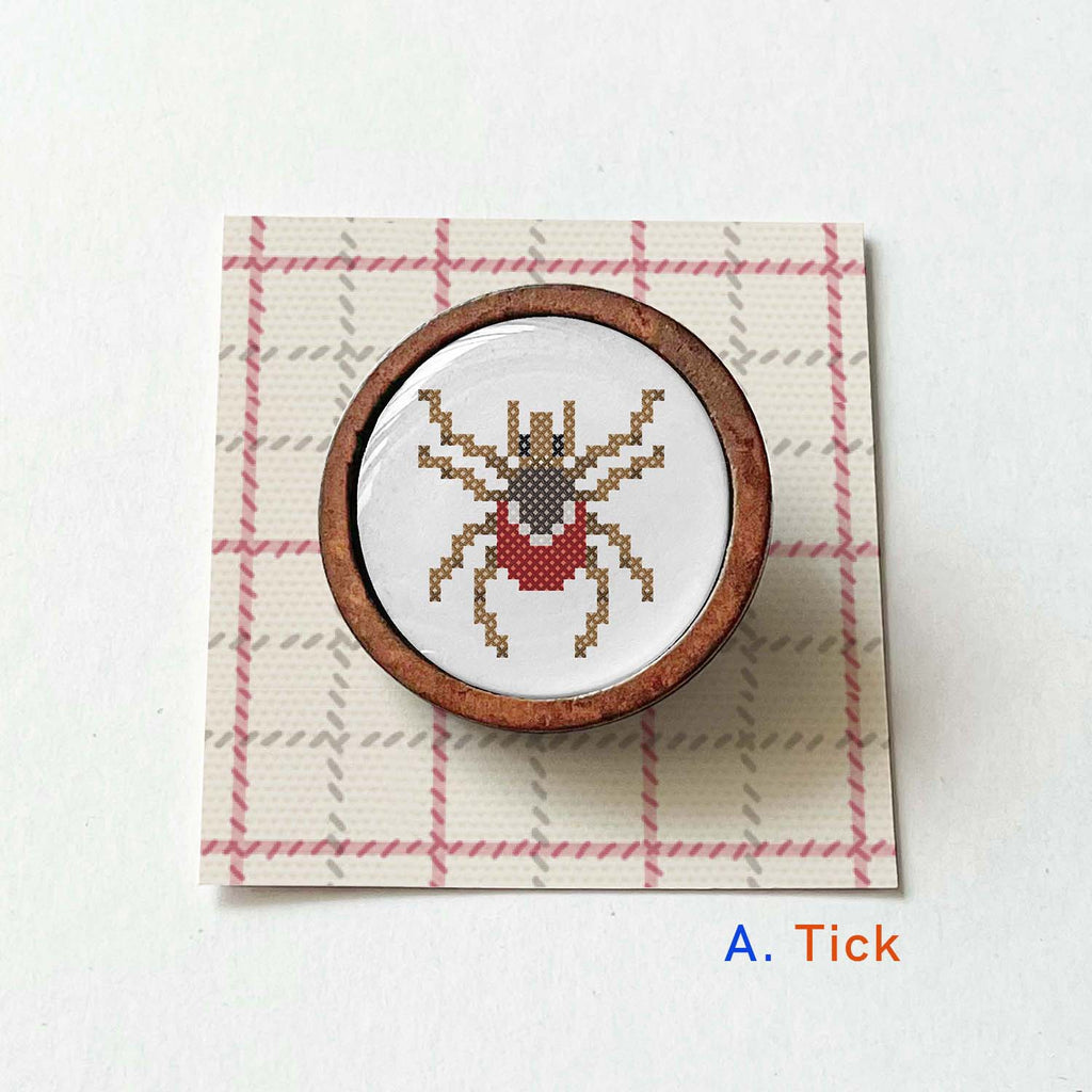 Parasite pin with wooden frame